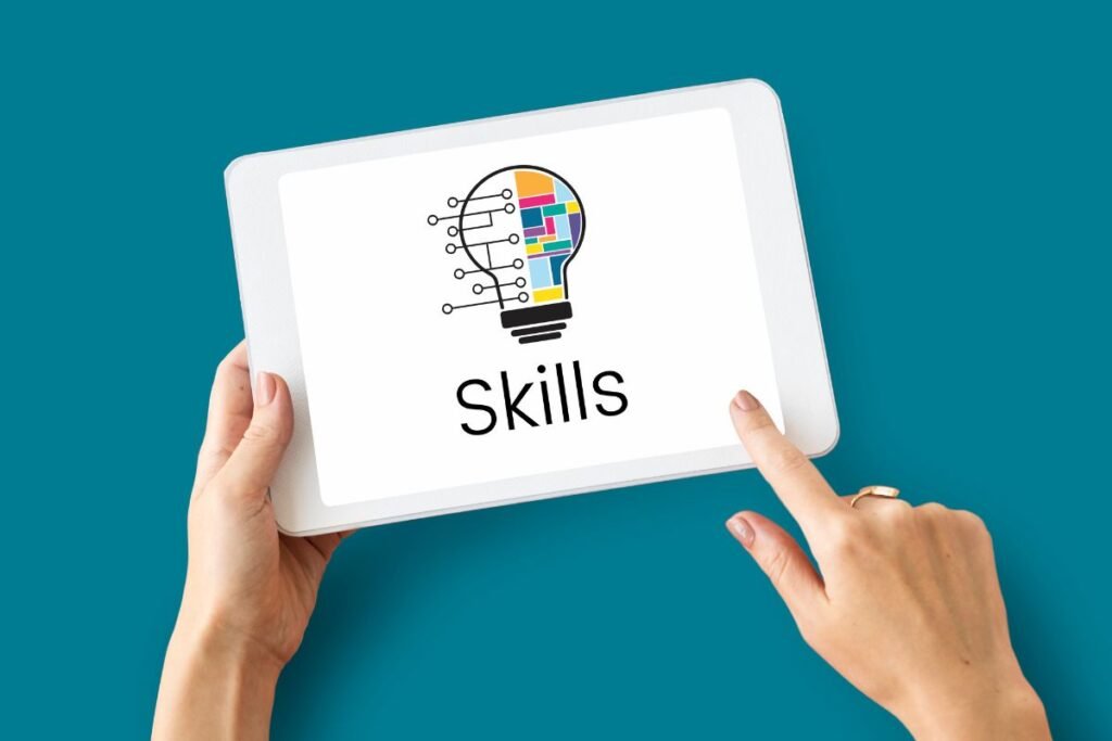 hands working digital device showing skills in screen