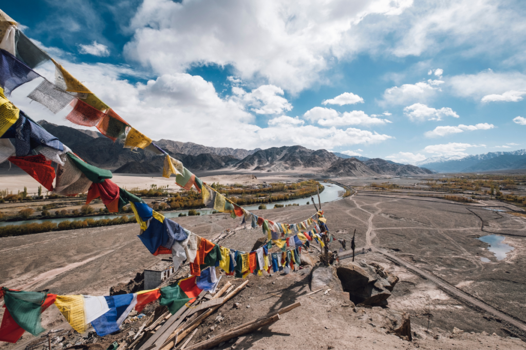 mountain with lungta flags