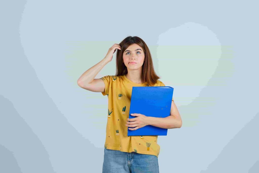 young girl in yellow top confused to choose a it course to study after completing high school
