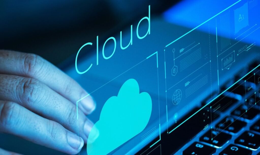 woman scrolling laptop performing cloud computing